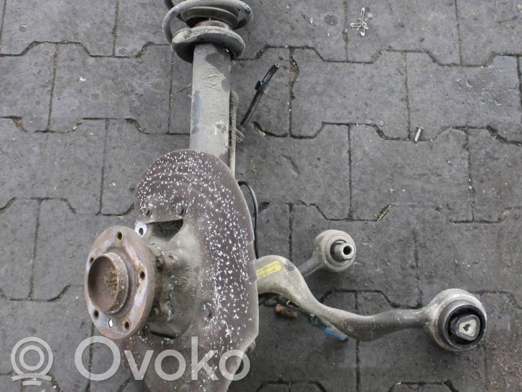 Front wheel hub spindle knuckle