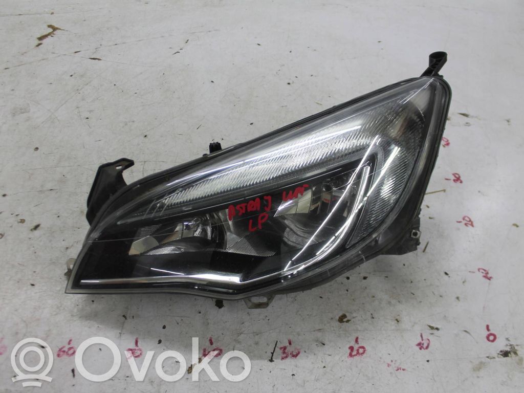 Opel Astra J Lampa przednia 