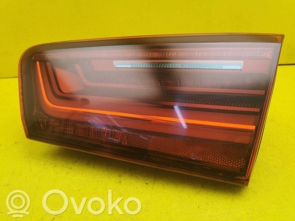 Audi A6 C7 Lampy tylnej klapy bagażnika 