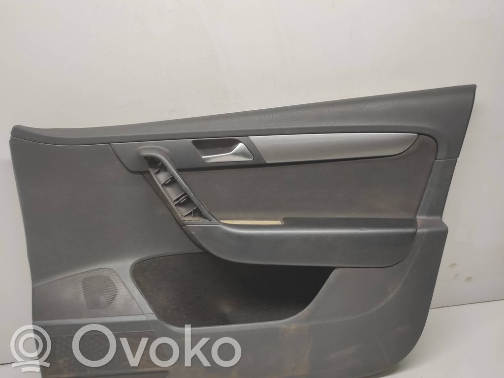 Volkswagen PASSAT B7 Обшивка передней двери 