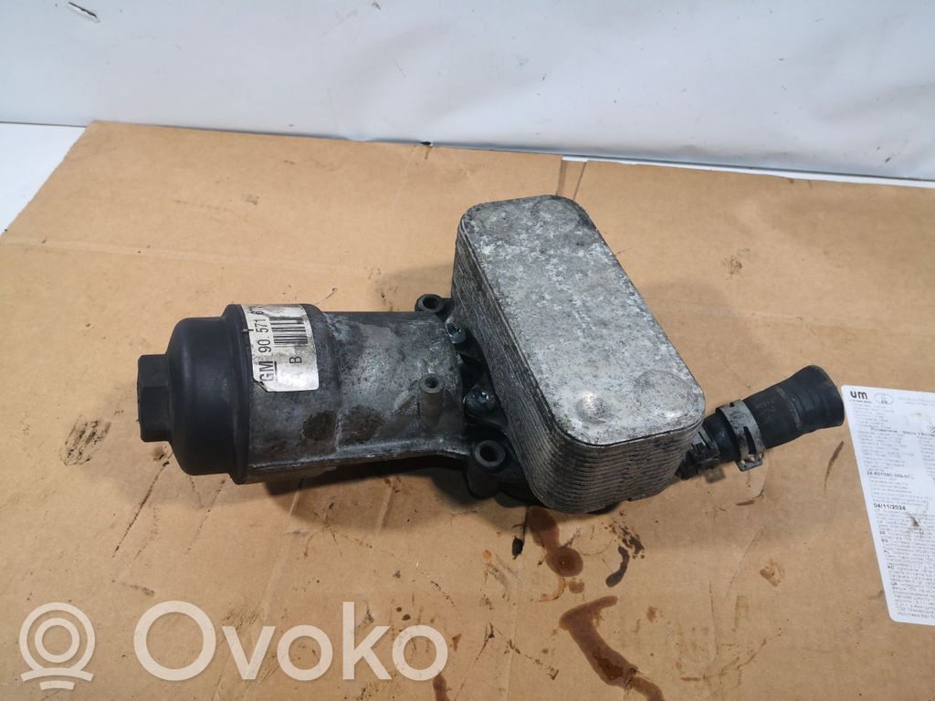 Opel Astra J Oil filter mounting bracket 