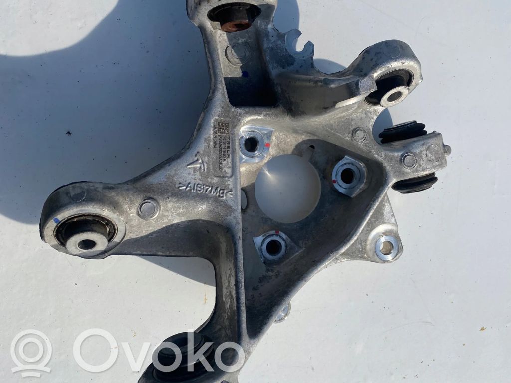 Tesla Model 3 Aizmugurē riteņa rumbas vārpstas šarnīrs (stupica, capfa) 