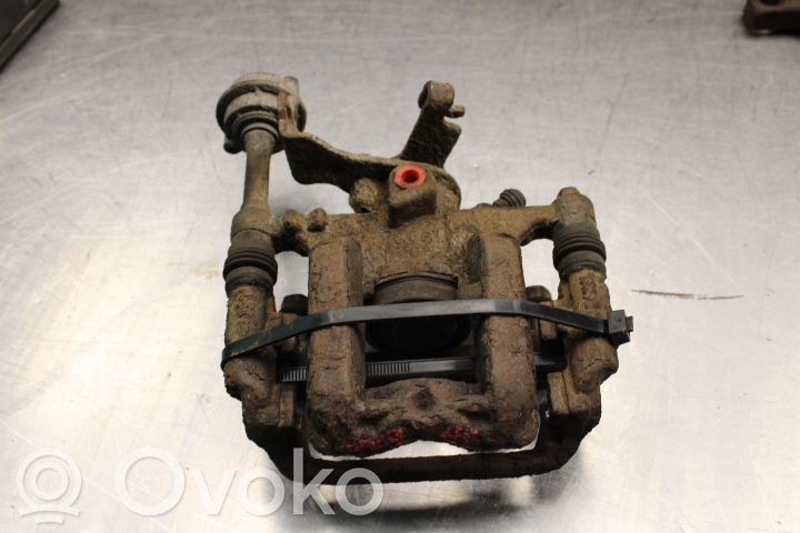 Opel Astra J Tylny zacisk hamulcowy 