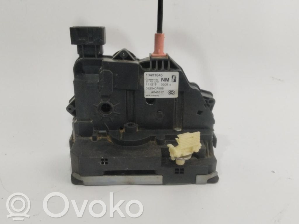 Opel Corsa E Zamek drzwi tylnych 