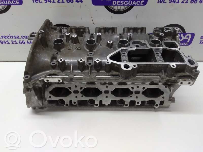 Engine head   06K103063AP