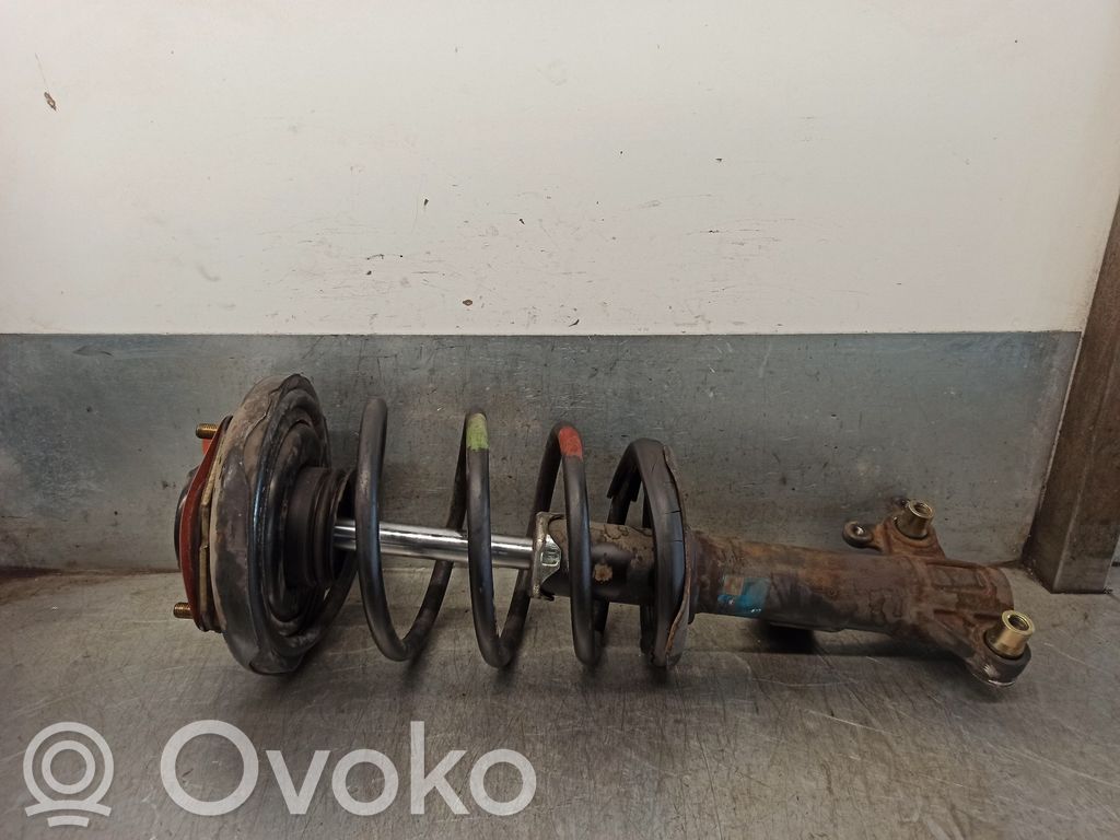 Nissan Primera Amortyzator osi przedniej ze sprężyną 