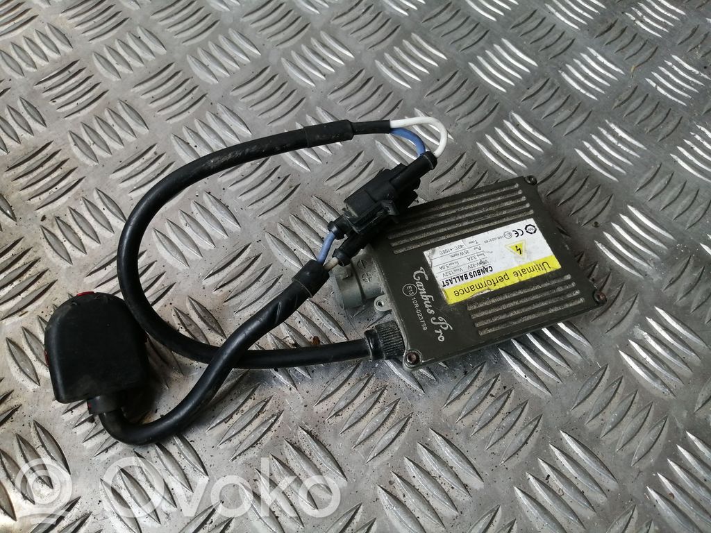 Volkswagen PASSAT B6 Lastre de faros xenón 