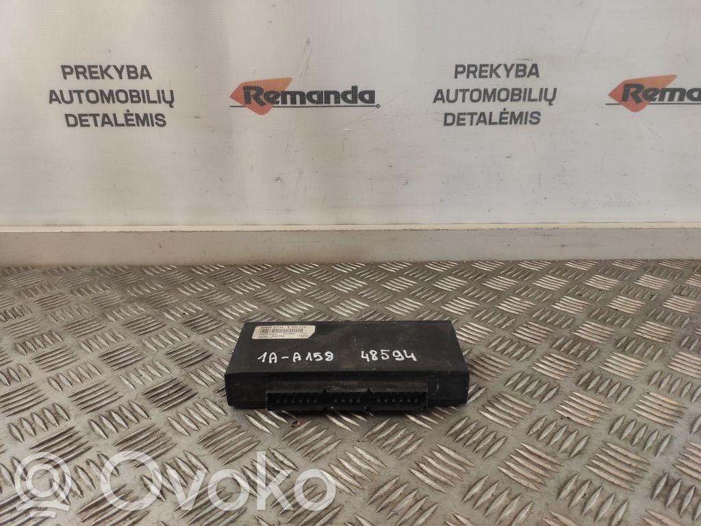 BMW 5 E34 Komforto modulis 