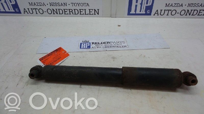 Rear shock absorber with coil spring