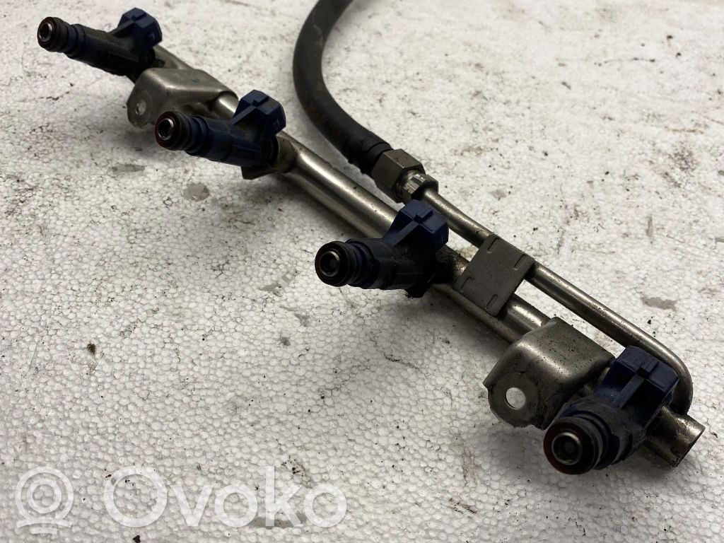 Inyector de combustible   06B133317A