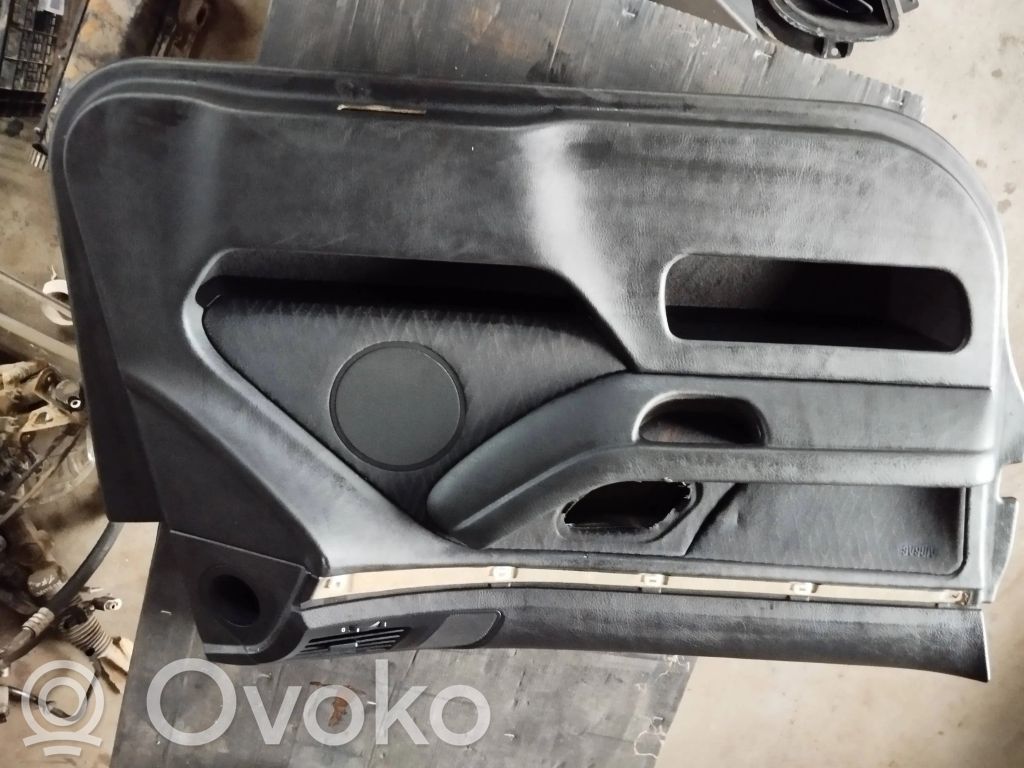 Front door card panel trim