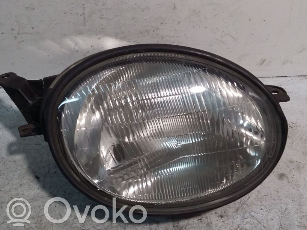 Toyota Corolla E110 Priekinis žibintas 