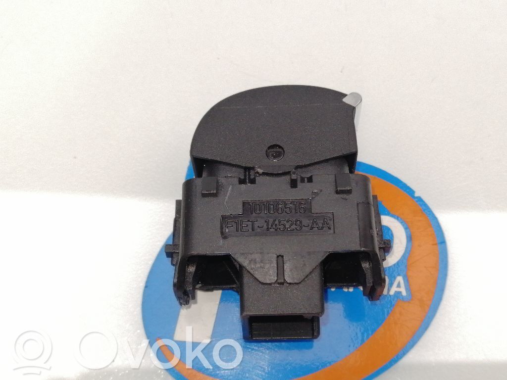 Comutator comandă geamuri electrice   F1ET14529AA