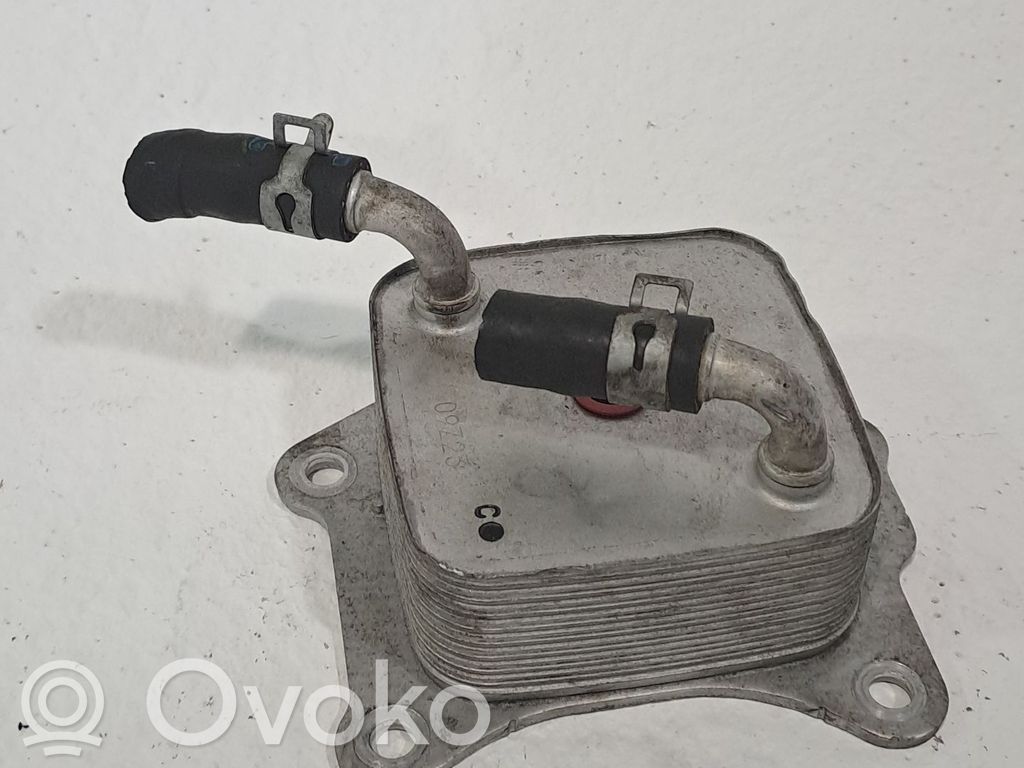 Oil filter mounting bracket   R2AA14700B