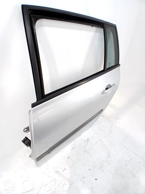 Puerta trasera   7751475034