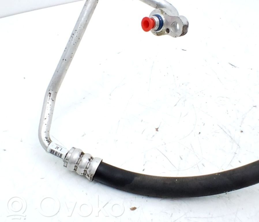 Manguito/racor flexible para A/C   977621W100