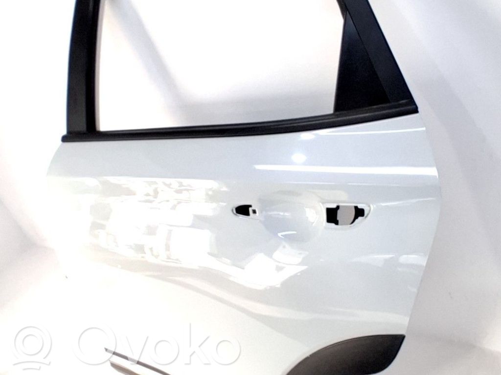 Puerta trasera   77003J9020