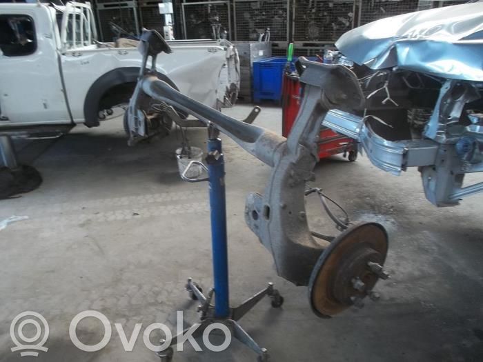 Opel Astra J Eje trasero 