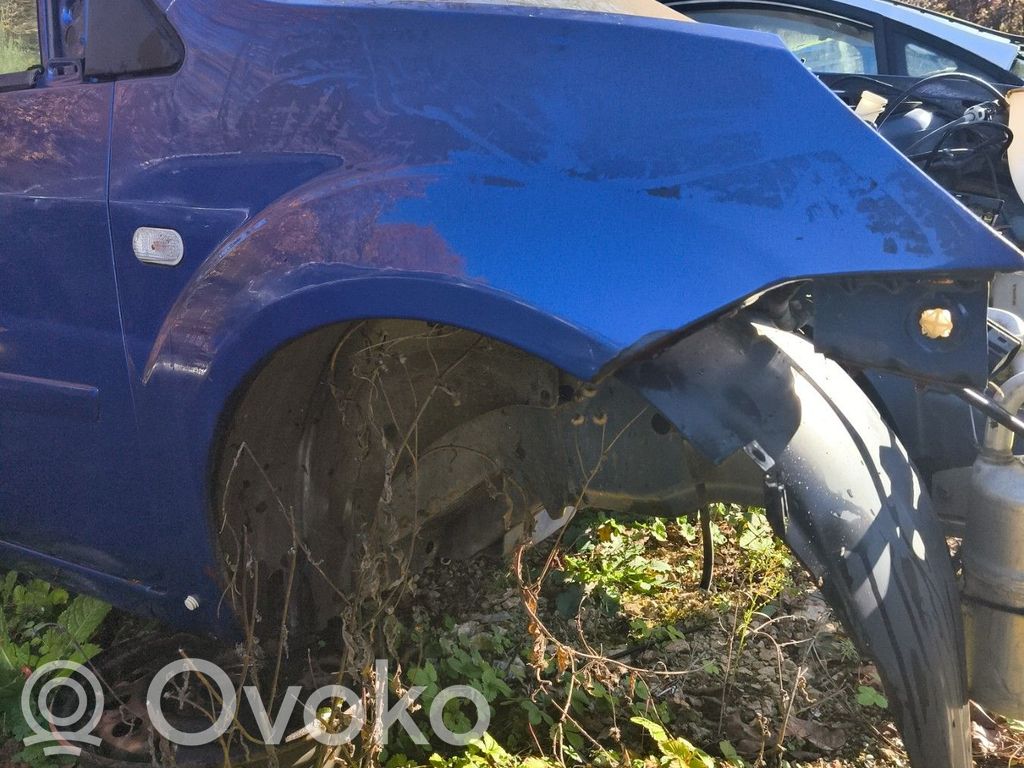 Ford Fiesta Błotnik przedni 
