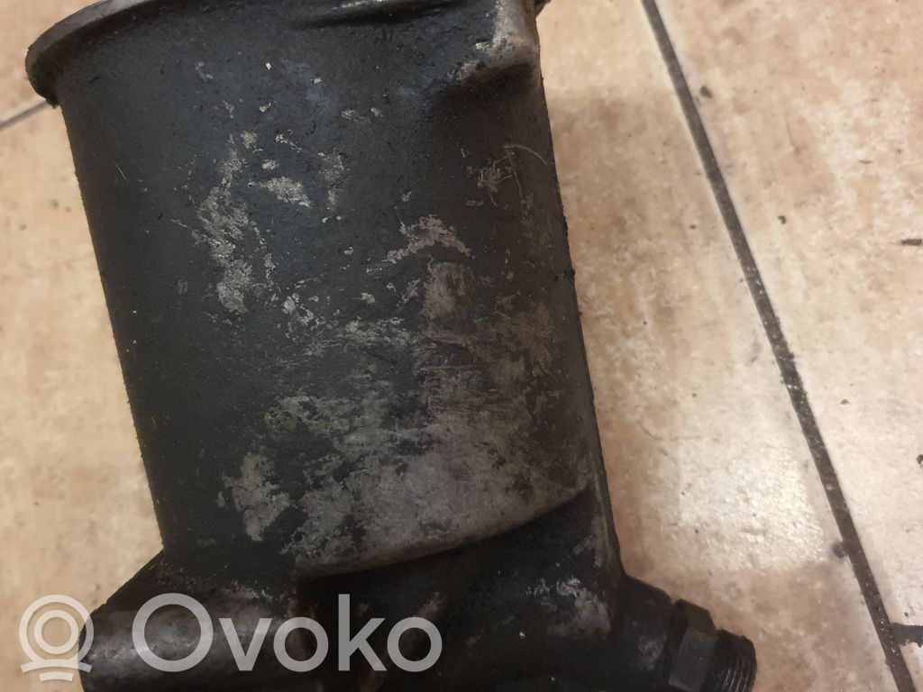 Oil filter mounting bracket   1285747