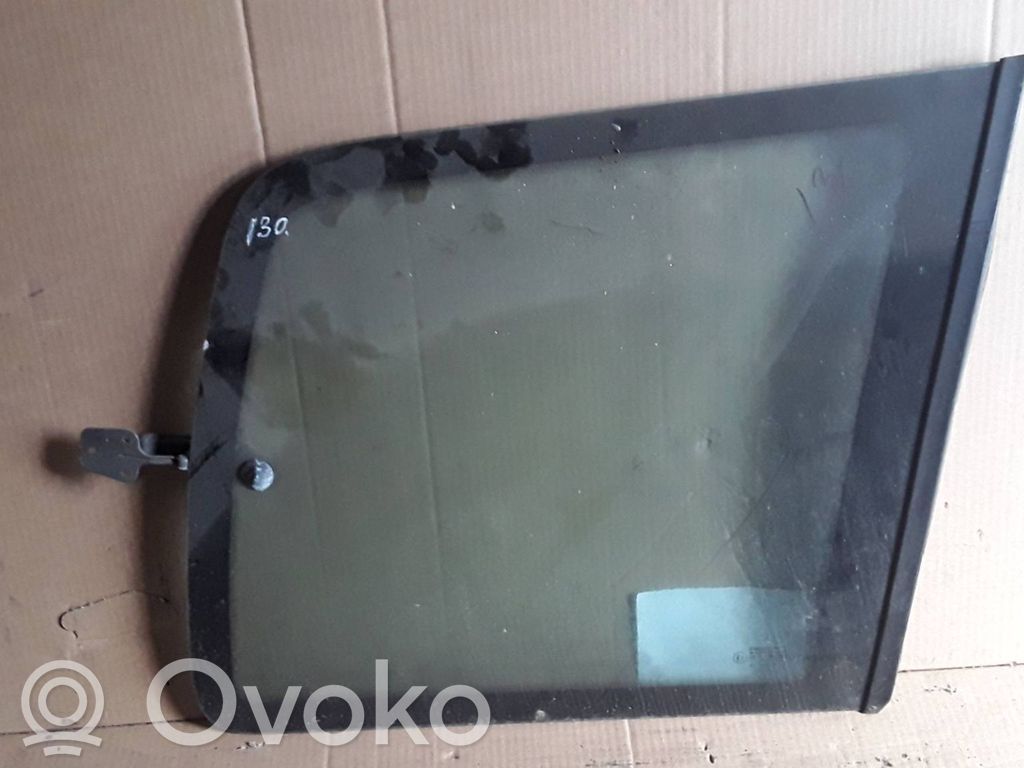 Vidrio lateral trasero   E243R000464