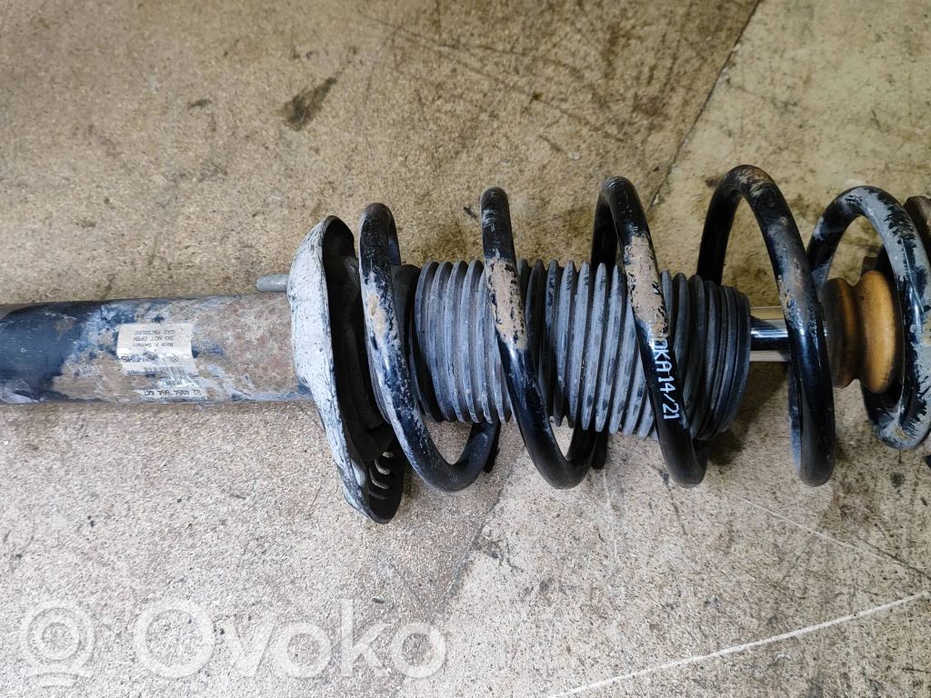 Volkswagen PASSAT CC Amortyzator osi przedniej ze sprężyną 