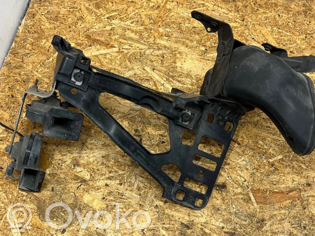 Headlight/headlamp mounting bracket   7163484,11267310,AM045M604