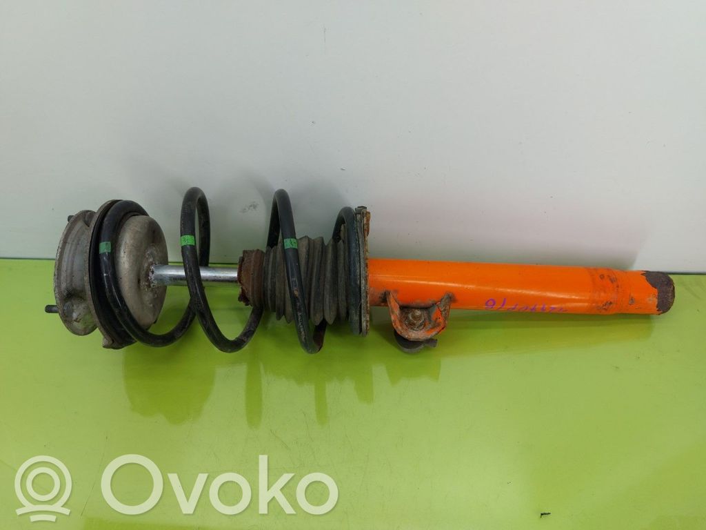 Front shock absorber with coil spring