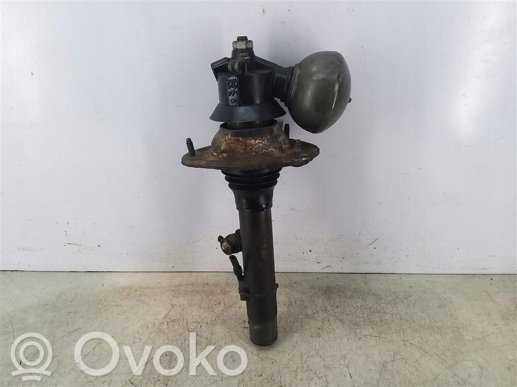 Front shock absorber with coil spring