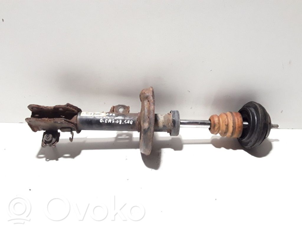 Opel Corsa D Priekšpusē amortizators 