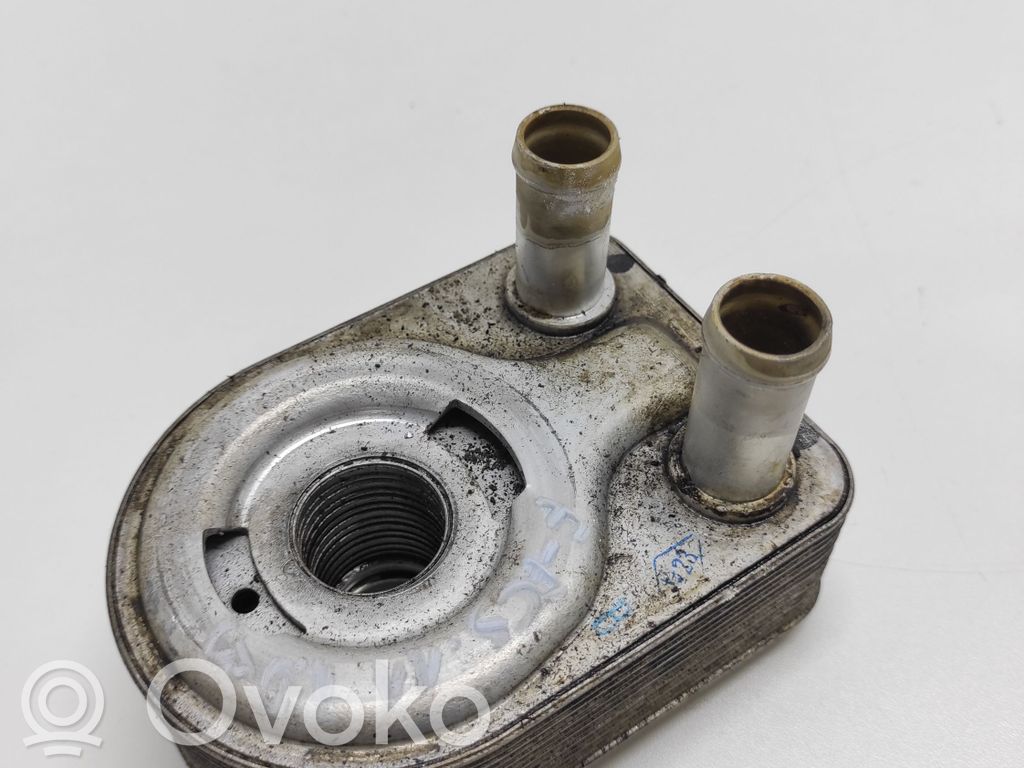 Oil filter mounting bracket   CM5G6B856EA