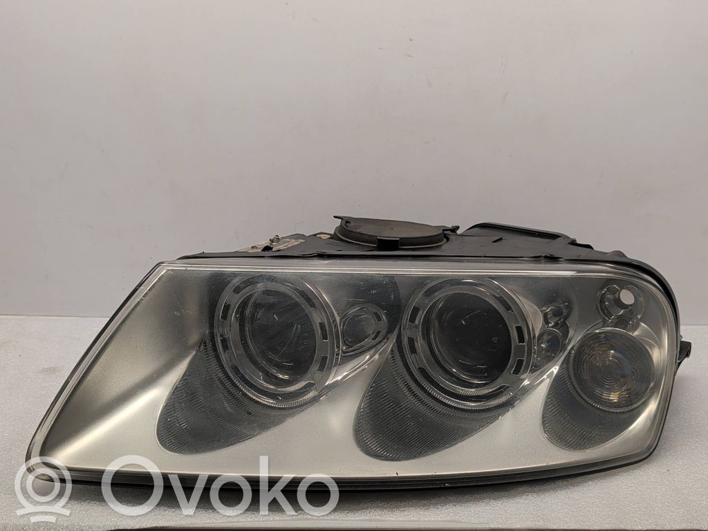 Volkswagen Touareg I Lampa przednia 