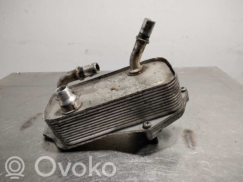 Engine oil radiator   7529499