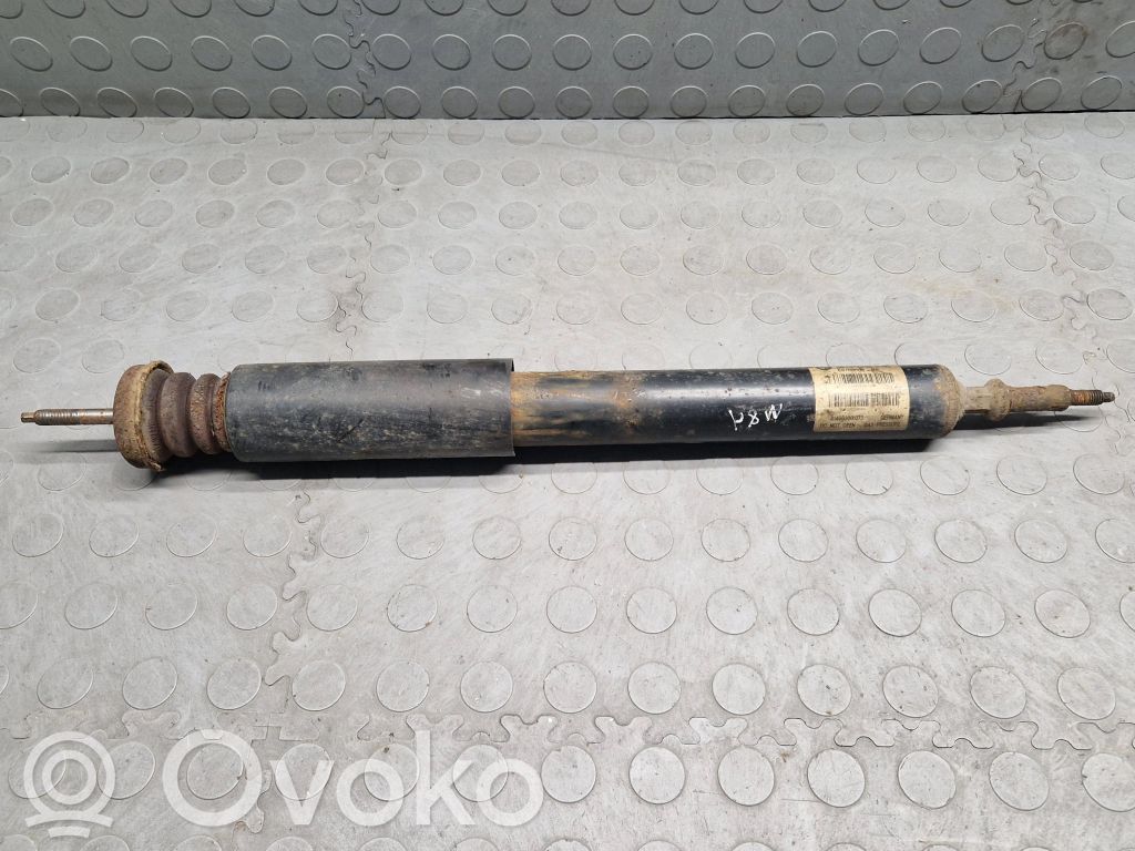 BMW 1 E81 E87 Aizmugurē amortizators 