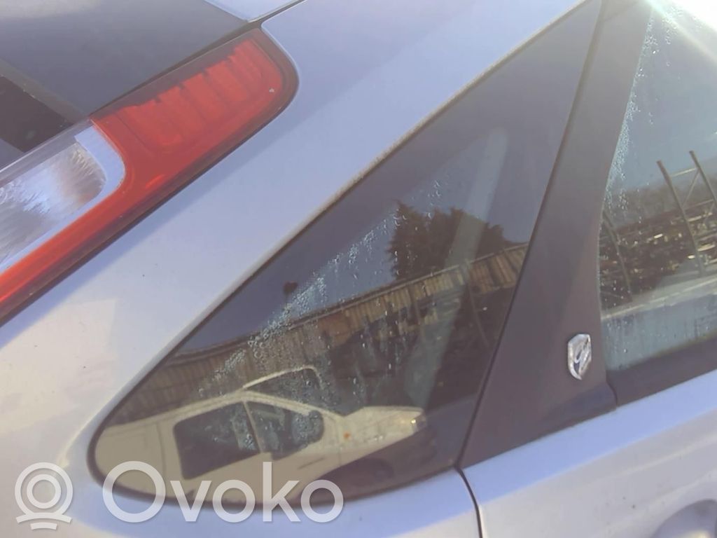Vidrio lateral trasero   1360766