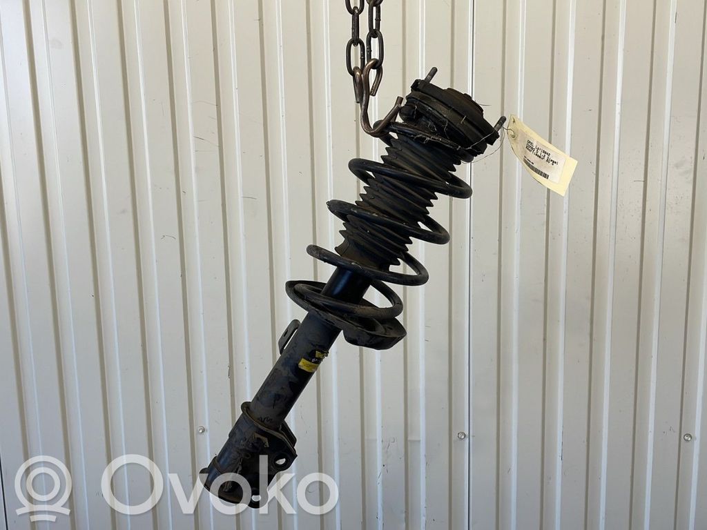 Opel Combo D Front shock absorber with coil spring 