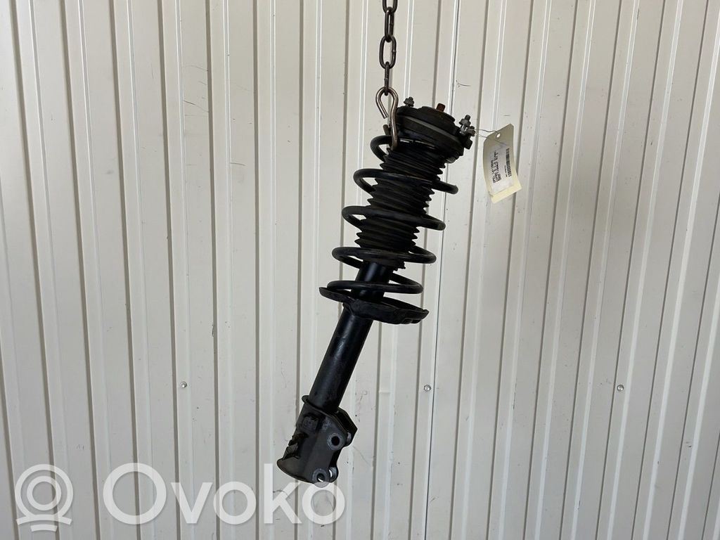 Opel Combo D Front shock absorber with coil spring 
