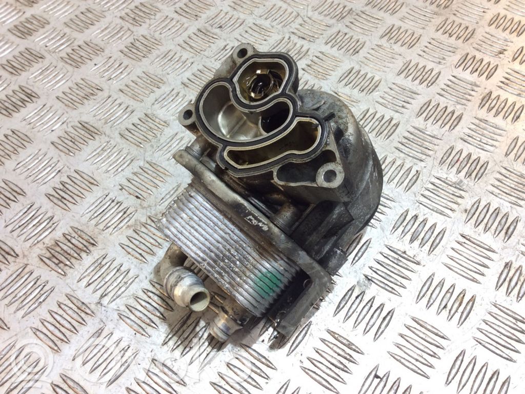 Oil filter mounting bracket   7574115