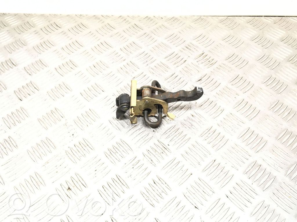 Front door check strap stopper
