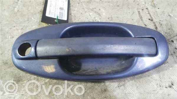 Hyundai Santa Fe Manecilla externa puerta delantera 