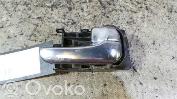 Nissan Primera Klamka wewnętrzna drzwi tylnych 