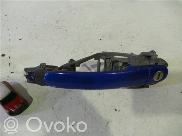 Volkswagen Golf V Front door exterior handle 
