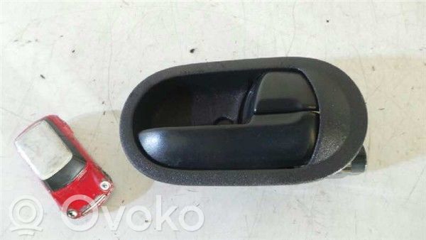 Mitsubishi Colt Manecilla interna puerta delantera 