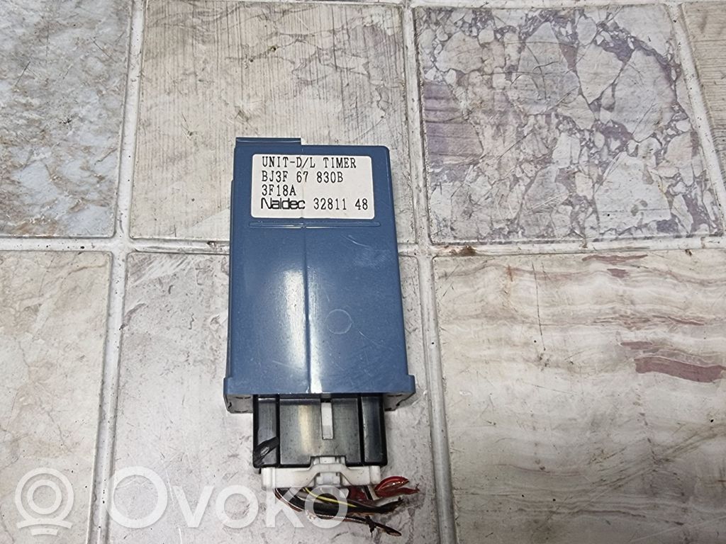 Mazda 323 F Door control unit/module 