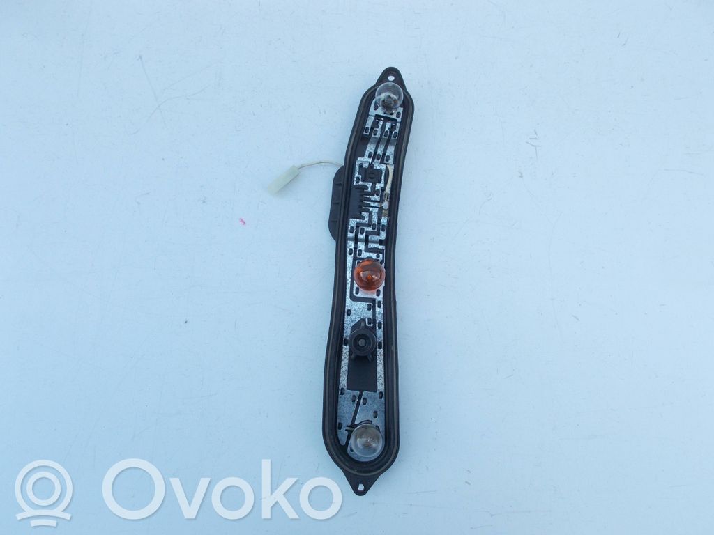 Fiat Panda II Takavalon polttimon suojan pidike 