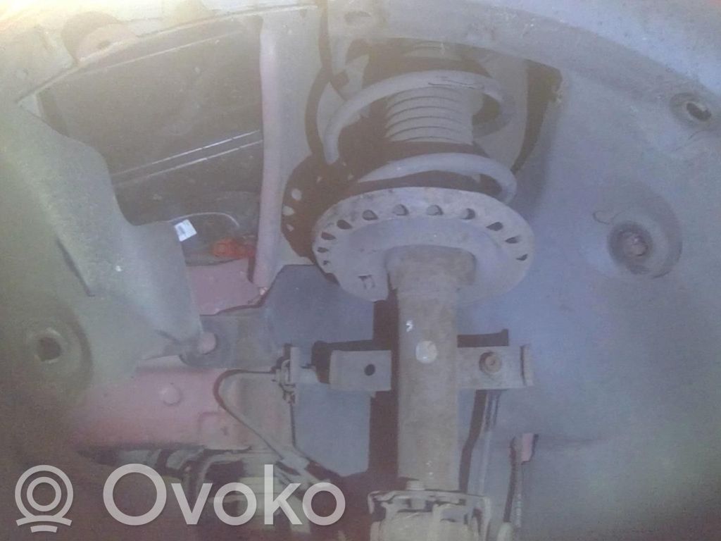 Renault Clio III Amortyzator osi przedniej ze sprężyną 