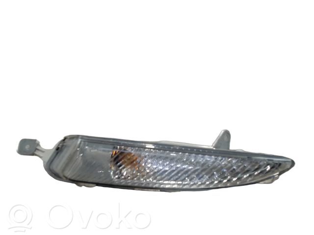 Opel Astra J Kierunkowskaz przedni 