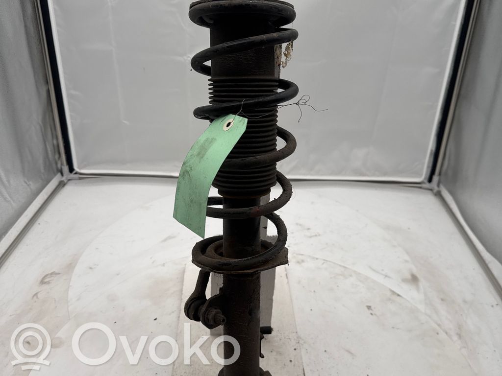 Nissan Note (E12) Front shock absorber with coil spring 