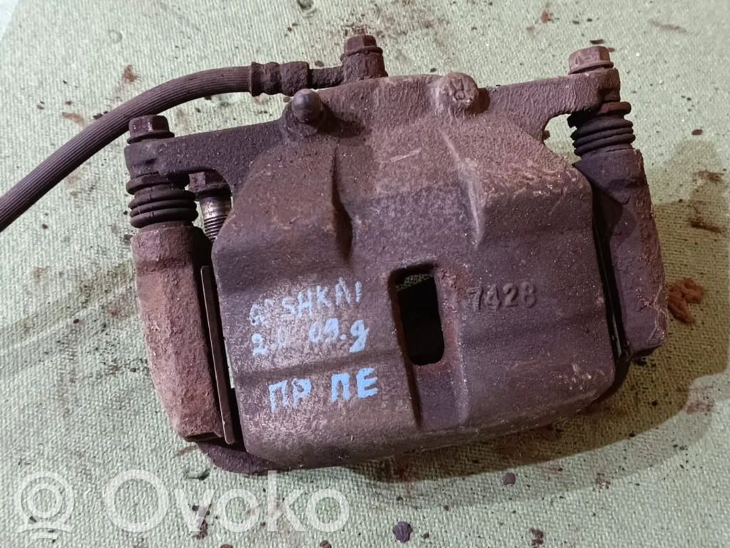 Nissan Qashqai+2 Front brake caliper 