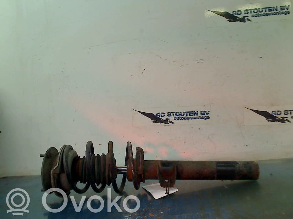 Front shock absorber with coil spring